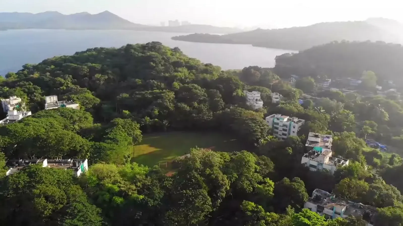 Aerial view of the IIM Mumbai campus beside the Powai and Vihar lakes